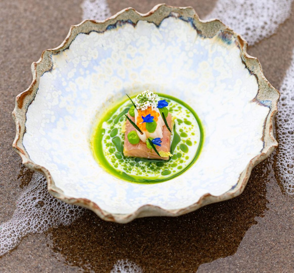 Where the earth, meets the sea